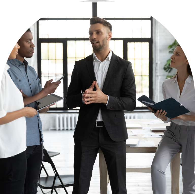 Businessman leading team meeting discussion.