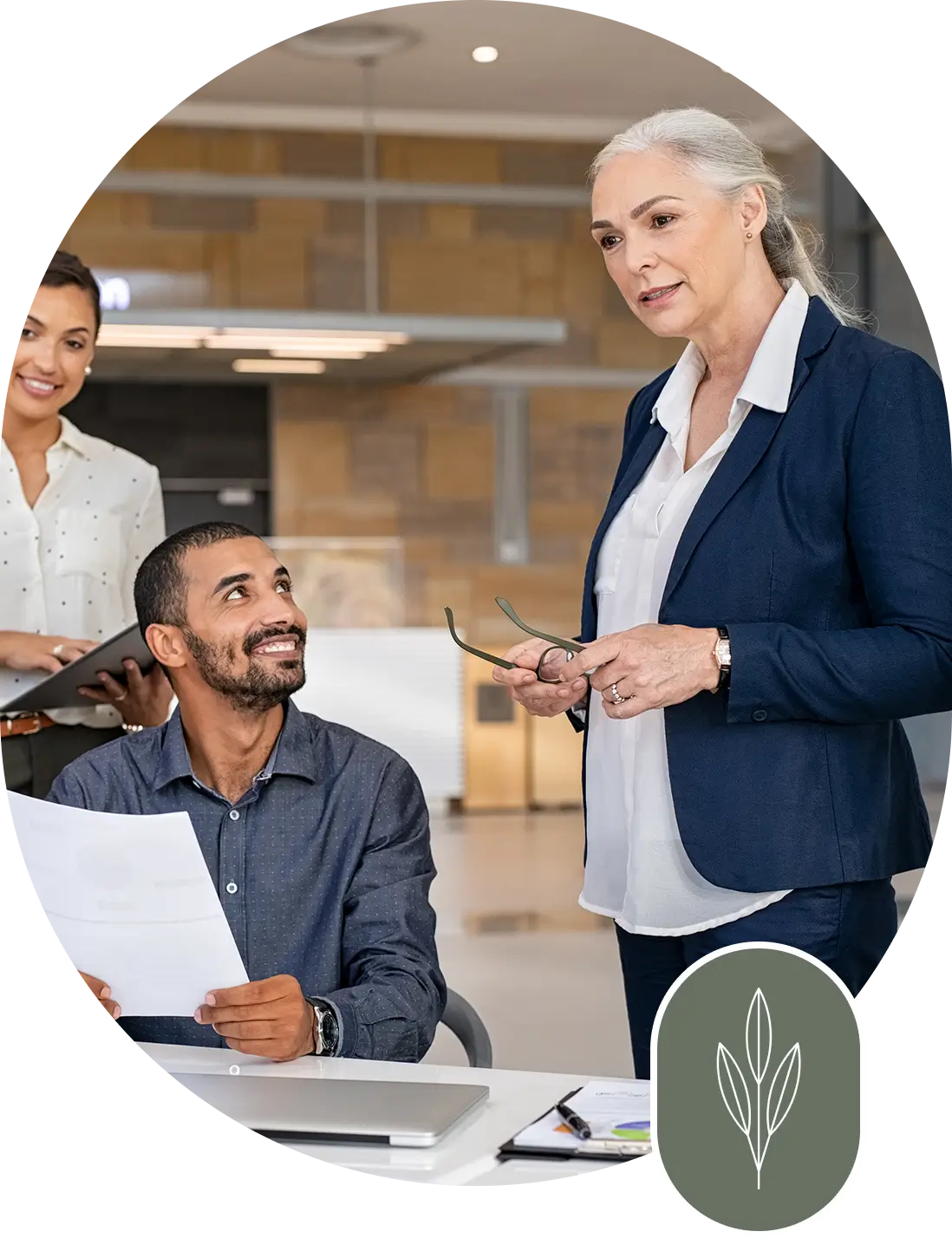 A man and woman standing in front of a table.